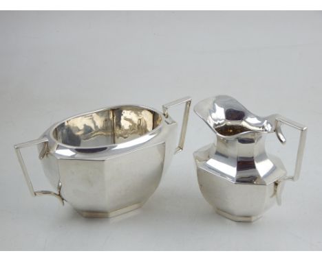 A silver milk jug and sucrier, Birmingham 1887 & '88, of rectangular faceted form, 13ozt.