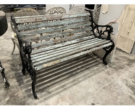 Black painted cast iron and wood slatted garden bench Dimensions: Height:&nbsp;75cm&nbsp; Length/Width:&nbsp;130cm&nbsp; Dept