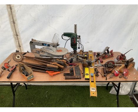 Large quantity of tools including, Stanley planes, hand cranked drills, Draper fret saw, pillar drill, saws and other tools -