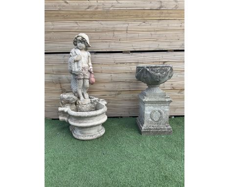 Three section cast stone garden figure of a boy carrying fishing net and a satchel with a water feature together with a cast 