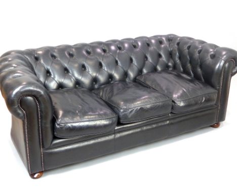 Chesterfield, contemporary black leather buttonback, roll arm sofa, bun feet, 185cm w.