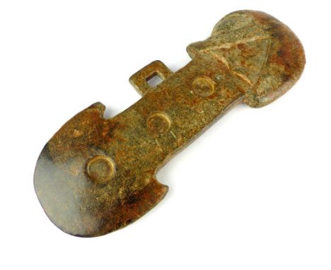 A large Chinese antique russet, green and black opaque jade Hongshan style phallic and axe form totem pendant, 26cm long.