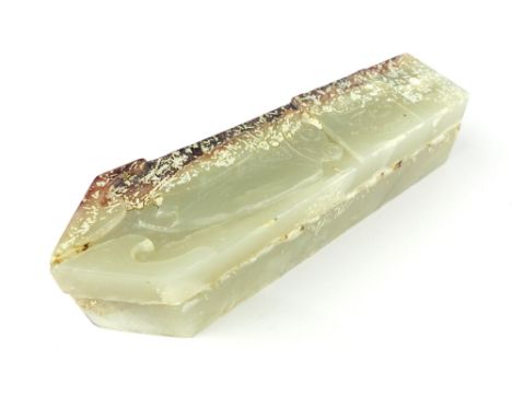 A Chinese carved jade sarcophagus box and cover decorated in relief with a cicada, 11cm long.