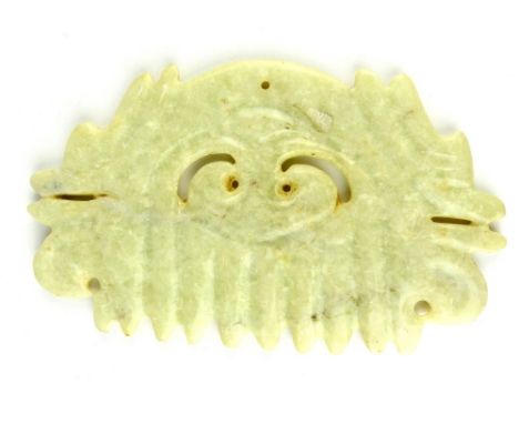 A Hongshui style pale celadon carved jade Gou Yun Pei mask, 15 x 9cm.