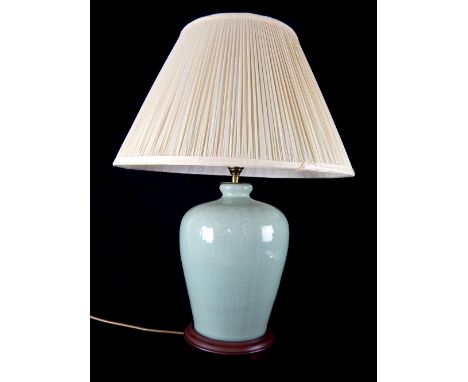 A Carlos Remes table lamp and shade, converted from an early 20th century Chinese celedon vase with incised baluster body on 