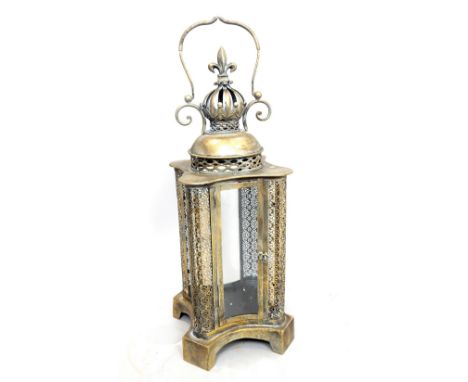 Garden candle storm lantern, gilt crown finial, curved four glass body, 68cm approx.