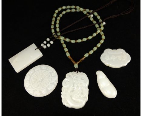 Five Chinese white jade pendants comprising ''peas in pod'' to bi form, a Taoist zodiac disc and a plain oblong tablet. (4)