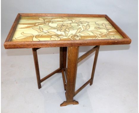 Early 20th century tilt top table, the rectangular folding top incorporating a tapestry panel, 78cm