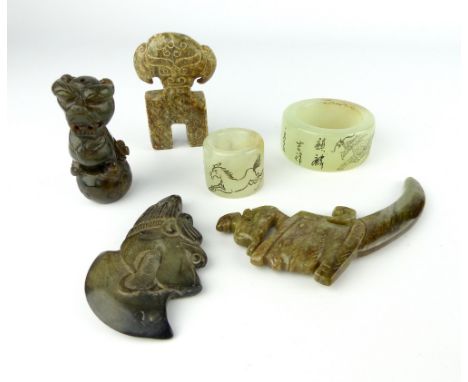 A good selection of various Chinese collectable jade items comprising two engraved rings, a temple gourd on a ball, a mini bl
