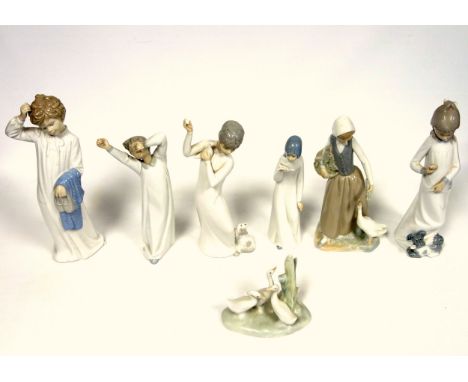 Nao figural group of a girl with basket and goose, H.24cm; group of 3 ducks/geese, W.12.5cm; Girl with terrier, H.25.5cm; boy
