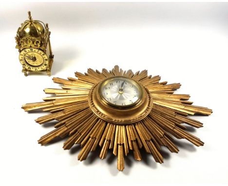 Carved giltwood "sunburst" timepiece with a quartz movement, W.45cm, and a brass lantern timepiece with a quartz movement, H.