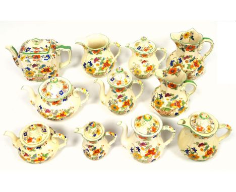 70 pieces of Mason's Ironstone "Bible" Pattern dinner, tea, and coffee ware, including 2 tureens with covers, meat plate, 2 s