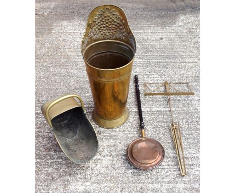 Brass grape carrier style stick stand, H.87cm; brass helmet shaped coal scuttle, W.47cm; Victorian copper warming pan, and a 