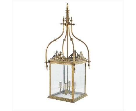 LARGE BRASS AND GLASS HALL LANTERN LATE 19TH CENTURY of squared form, the glass panes surmounted by pierced foliate mounts an