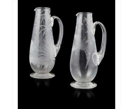 TWO VICTORIAN WHEEL-ENGRAVED JUGS 19TH CENTURY of slender bellied form and raised on flat feet, the first with a swan amongst