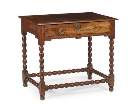 QUEEN ANNE WALNUT TABLE EARLY 18TH CENTURY the top with a moulded edge above a long frieze drawer, raised on bobbin turned le