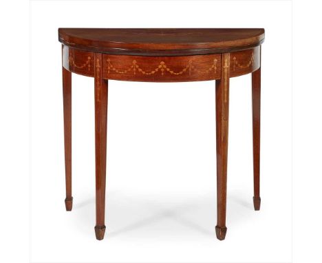 LATE GEORGE III MAHOGANY INLAID CARD TABLE LATE 18TH CENTURY the crossbanded fold-over demilune top inlaid with husk trails a