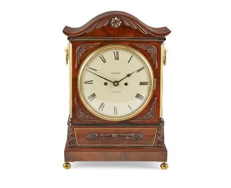 WILLIAM IV MAHOGANY AND BRASS BRACKET CLOCK EARLY 19TH CENTURY the arched pediment case with foliate carving above a cream en