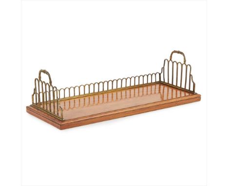 REGENCY GILT BRASS MOUNTED MAHOGANY BOOK TROUGH EARLY 19TH CENTURY the three-quarter pierced arch gallery with handles to eit