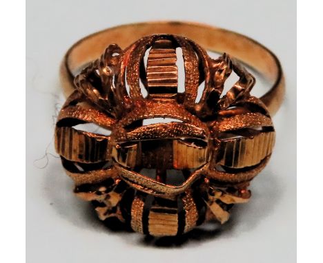 Unhallmarked yellow metal piercework decorated dress ring. 3.4g

Reasonable used condition 