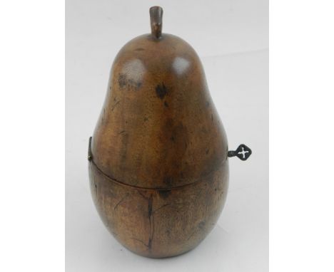 A novelty fruitwood tea caddy, fashioned as a pear.  H: 19cm