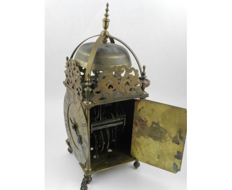 A mid 18th century and later brass lantern clock, dial marked Nathaniel Hedge of Suffolk, with a pierced and foliate engraved