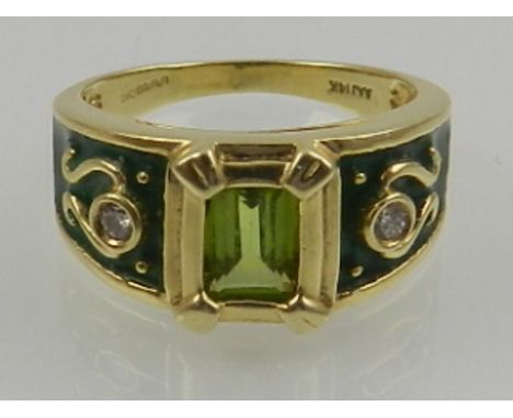 A 14 carat yellow gold, enamel, and peridot ring, the shoulders set with two round cut diamonds. 