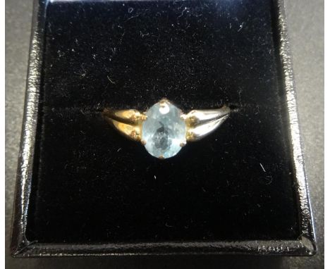 AQUAMARINE SINGLE STONE RINGthe oval cut aquamarine approximately 1ct, on fourteen carat gold shank, ring size R 