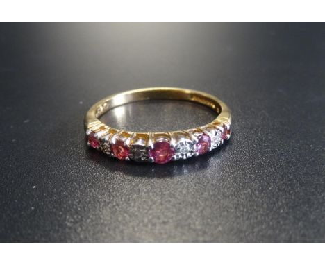 RUBY AND DIAMOND HALF ETERNITY RINGwith alternating rubies and diamonds, on nine carat gold shank, ring size P 