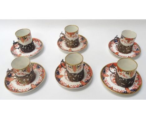 ROYAL CROWN DERBY 2712 PATTERN COFFEE SERVICEcomprising six coffee cans and saucers, the coffee cans with pierced silver slee