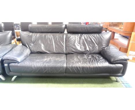 MODERN BLACK LEATHER SUITE OF FURNITUREcomprising a large two seat sofa, a small two seat sofa and an armchair and footstool,