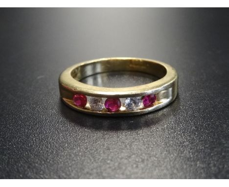 CHANNEL SET RUBY AND CZ FIVE STONE RINGin nine carat gold, ring size N-O 