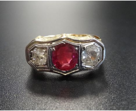 SYNTHETIC RUBY AND DIAMOND THREE STONE RING the central round cut ruby approximately 1ct flanked by diamonds totalling approx