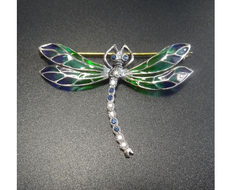 DIAMOND, SAPPHIRE AND ENAMEL DRAGONFLY BROOCHthe head and tale set with diamonds and sapphires, the wings divided into colour