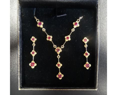 ATTRACTIVE RUBY SET NECKLACE AND MATCHING DROP EARRINGSall in nine carat gold, the necklace with ruby drop pendant section on