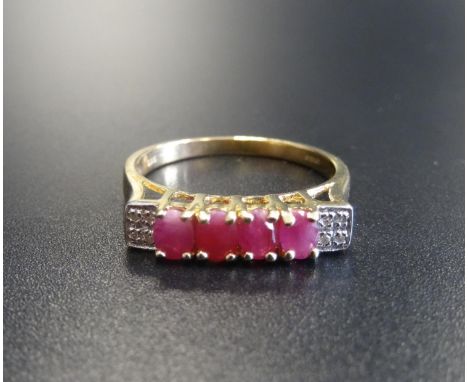 RUBY AND DIAMOND RINGthe four oval cut rubies flanked by four small diamonds to each shoulder, on nine carat gold shank, ring