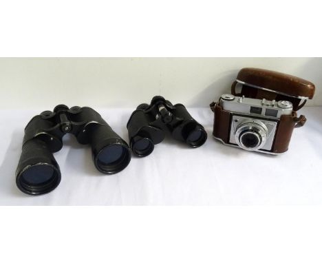 PAIR OF PRINZ FIELD GLASSESwith 12x50 magnification, contained in a brown leather case, a pair of Frank-Nipole field glasses 
