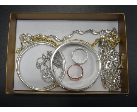 SMALL SELECTION OF SILVER JEWELLERYincluding a mother of pearl set bangle, a double entwined bangle, a heavy neck chain, brac