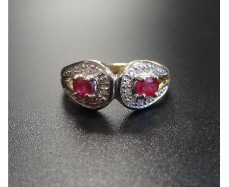 RUBY AND DIAMOND CLUSTER RINGeach of the two rubies in diamond surround, on nine carat gold shank, ring size M-N 