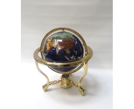 TABLE TOP TERRESTRIAL GLOBEwith inset hardstones, mounted on a gilt metal stand with a compass below, 36cm high 