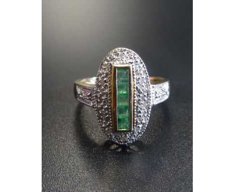 ART DECO STYLE EMERALD AND DIAMOND PLAQUE RINGthe vertical row of square cut emeralds in diamond set surround, in nine carat 