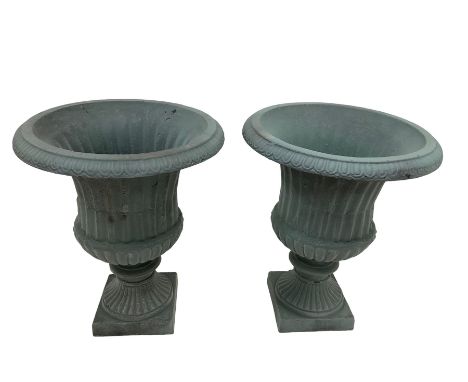 Pair Victorian design cast iron Campana shaped garden urns with base, with fluted and gadroon decoration in washed blue finis