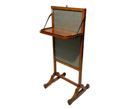 Late George III satinwood fire screen, upholstered in floral blue fabric, fold-down lipped tray with central figured walnut o