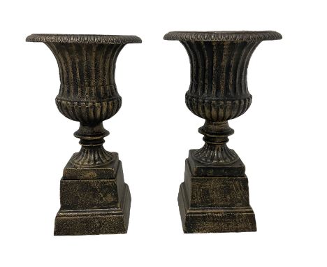 Pair Victorian design cast iron Campana shaped garden urns with base, in black and gilt finishDimensions: Height:&nbsp;51cm&n