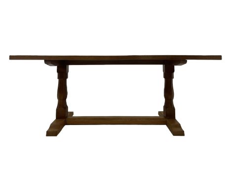 Eagleman - oak dining table, rectangular adzed oak top, twin octagonal pillar supports on sledge feet, united by floor stretc