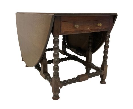 19th century oak drop leaf dining table, oval top fitted with single drawer to each side, bobbin turned gate leg supports uni