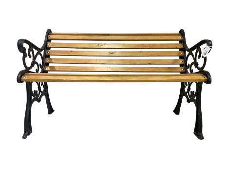 Black painted cast iron and wood slated garden bench Dimensions: Height:&nbsp;80cm&nbsp; Length/Width:&nbsp;124cm&nbsp; Depth