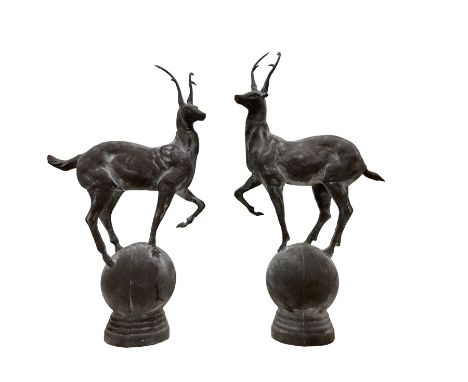 Pair of cast iron garden stag finials atop a sphere base, in rustic finishDimensions: Height:&nbsp;92cm&nbsp; Length/Width:&n