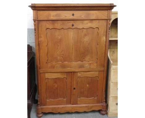 A French chestnut secretaire a abattant fitted with single frieze drawer above drop down flap enclosing shelf, central enclos