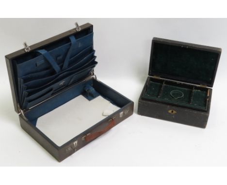 An early 20th Century light blue leather writing case with leather fitted interior and lift out blotter with dip pen together